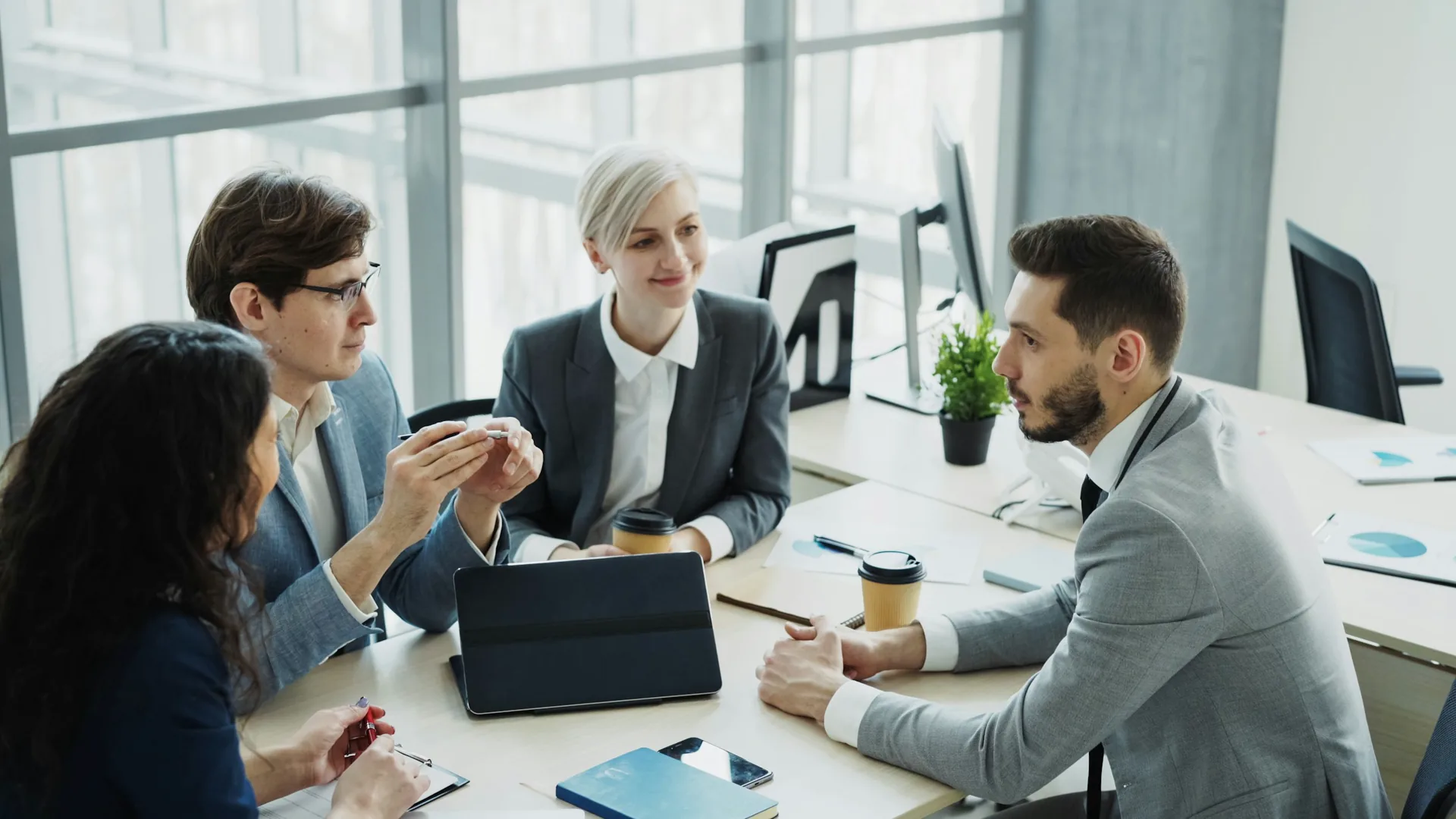 Illustration of a team reviewing business records